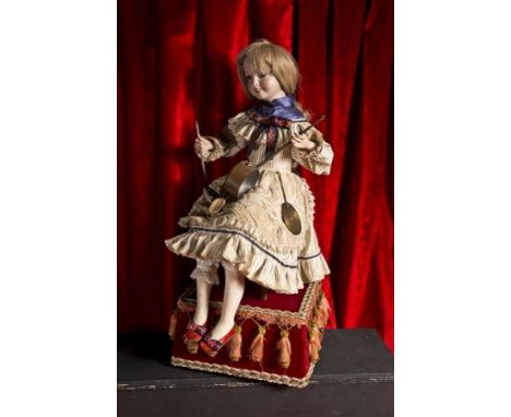 The percussionist with kitchen gadgets by MARCU Artwork by Michel Marcu. Small mechanical automaton of a young woman with bis