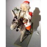 Father Christmas and his donkey