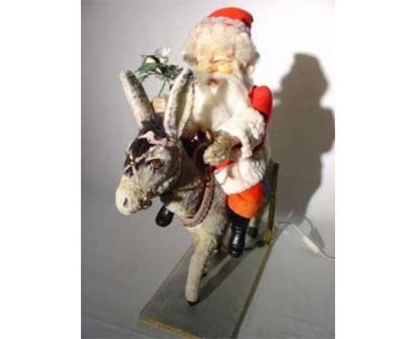 Father Christmas and his donkey Electrified window display automaton with 2 movements in good working condition (FR) Dimensio
