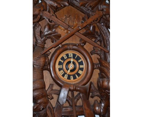 Fantastic Black Forest Cuckoo Clock with music box One of the largest Cuckoo Clock ever built. Beautiful carving with a big d