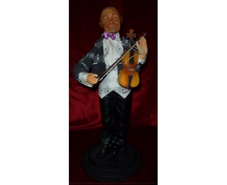 The costume violinist Electrified window display automaton with 2 movements in good working condition (FR) Dimensions: 0,70 x