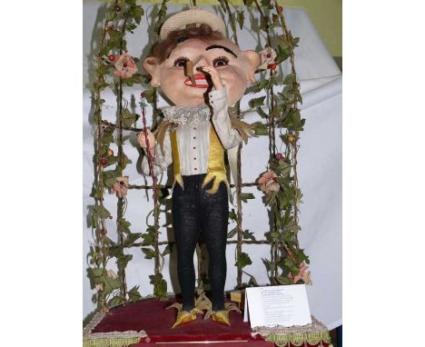 Dandy ,pipe smoking automaton by Marcu The pipe-smoking dandy Creation by Michel MARCU. It performs movements of eyes and arm