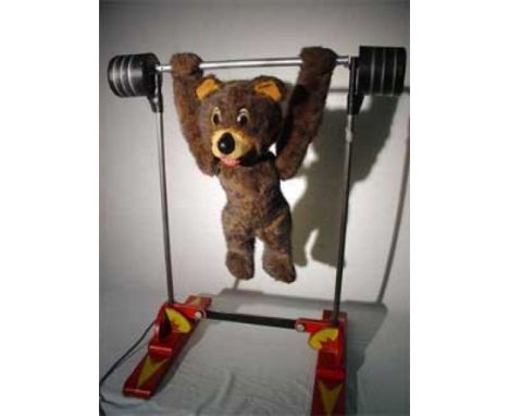 Bear with altered Automaton in metal and synthetic fur. Electrified window display automaton with 4 movements in good working