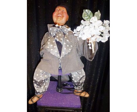 Big man with flowers Large figure holding a bouquet of flowers Electrified window display automaton with 2 movements in good 