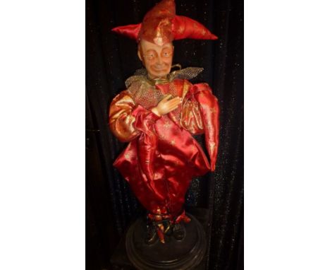 Jester of the king Le Fou du Roi in red dress. Electrified window display automaton with 2 movements in good working conditio