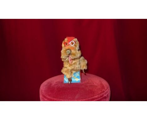 Trumpet playing monkey Japanese manufacturing, brand Cragstan, plush and metal. (FR) Dimensions: H: 0,26