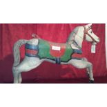 White wooden carousel horse, gray and red