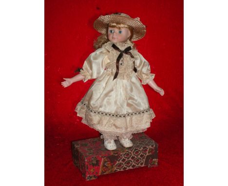 Province Demoiselle Biscuit automaton. Standing with arms outstretched in white satin dress and wearing a straw hat. 2 moveme