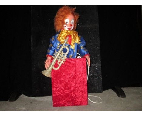 Clown in box Clown trumpeter out of a box Electrified window display automaton with 1 movements in good working condition (FR