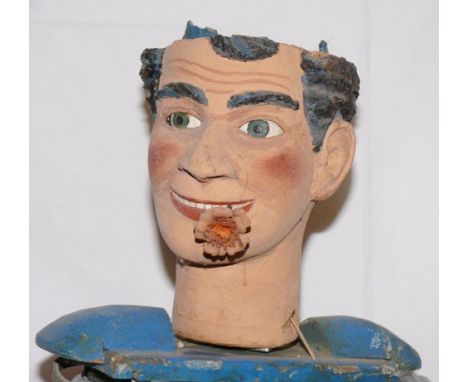Automaton head carved in wood Carved wooden head, by famous swiss auatomaton builder P. Zwahlen (FR) Dimensions: 0,30 x 0,30 