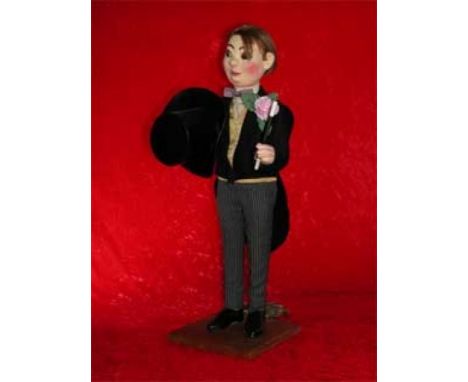 The magician with top hat Electrified window display automaton with 2 movements in good working condition (FR) Dimensions: 0,