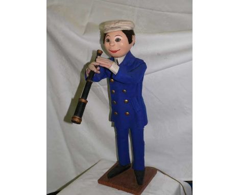 Marine Captain by JAF Automaton by JAF of a sailor standing and holding a telescope, mobile eyes. Electrified window display 