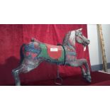 White wooden carousel horse, gray and red