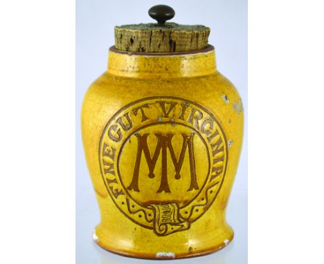 SHOP DISPLAY TOBACCO JAR. 10.5ins tall to top of cork lid with brass finial, mustard glaze with brown lettering FINE CUT VIRG