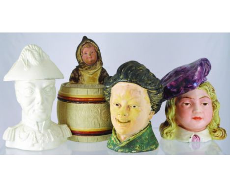 GROUP OF TOBACCO JARS. Duke of Wellington character jar in matt white finish. Plus hooded child finial on lid barrel shape ja