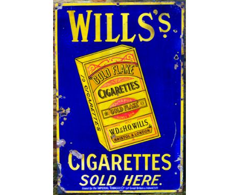 WILLS S CIGARETTES ENAMEL SIGN. With wooden backing 36 by 24ins, WILLS S/ CIGARETTES SOLD HERE with cigarette packet pictured