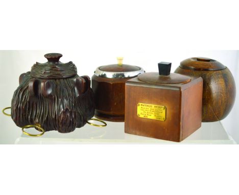 TREEN TOBACCO JAR GROUP. Square shape with brass plaque made from elm wood, from Waterloo Bridge. Black Forest jar with pipe 