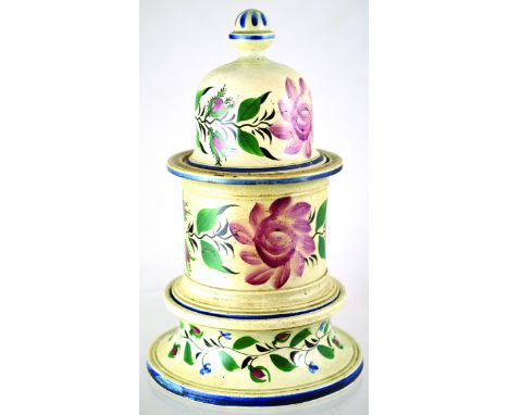 ENGLISH CERAMIC TOBACCO JAR. 3 piece cover jar & stand, 11.25ins tall, hand painted floral decoration (roses?) on white groun