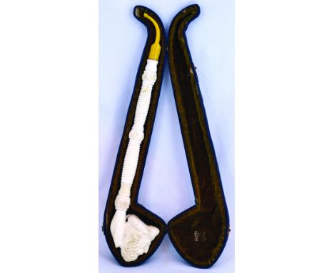 GIANT MEERSCHAUM PIPE. In fitted case 16.75ins long, bearded mans head on decorative stem. Very good.