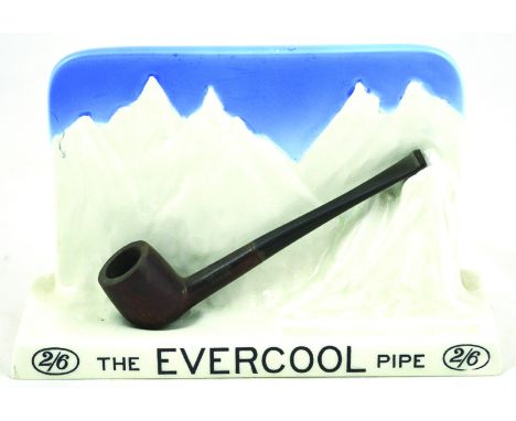 THE EVERCOOL PIPE ADVERTISING PIPE STAND. 5.25ins tall, 8ins long, blue & white glaze, 2/6 THE EVERCOOL PIPE 2/6 in black let