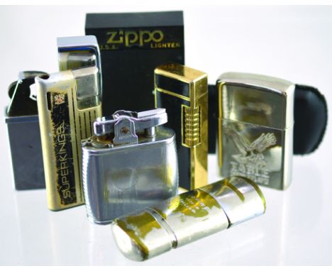 CIGARETTE LIGHTERS. Includes cased silver coated zippo lighter, Tommy pipe lighter, Ronson & Eagle flame lighter etc. (7) (7/