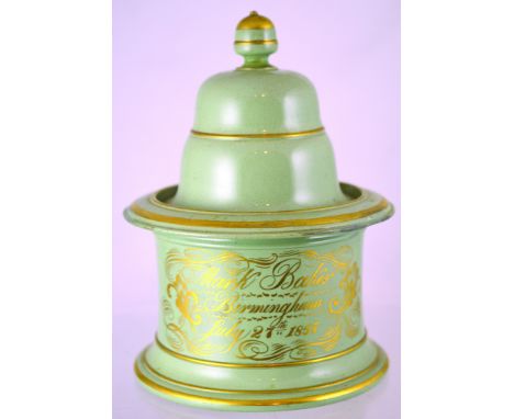 ENGLISH CERAMIC TOBACCO JAR. 8.25ins tall to top of domed cover, pale green with gold highlights, inscription MARK BAKER BIRM