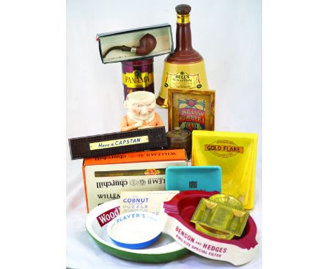 MIXED GROUP. Ashtrays & change trays, figural tobacco jar (no lid), advertising peg board, Bells decanter, Cobnut Sliced puzz