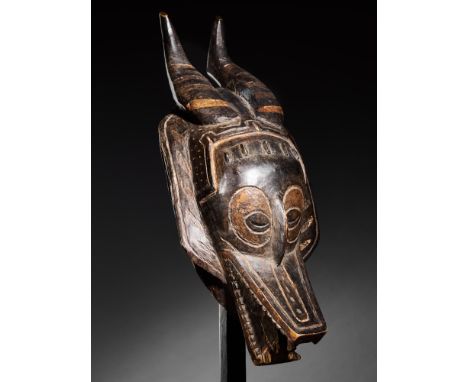 Tribal/Ethnographic: Zamble half man, half animal mask, Guro People, Ivory Coast, 2nd quarter of 20th century,  43cm high. Ho