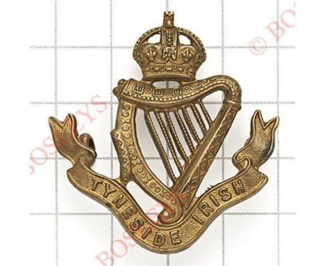 Tyneside Irish scarce first pattern brass badge by Reid.Die-stamped. (KK 1138)