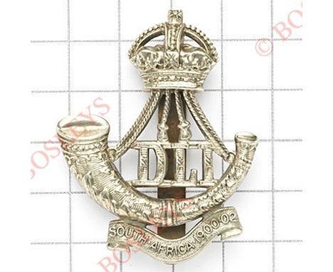 5th, 7th, 8th & 9th Bns. Durham Light Infantry cap badge.Die-stamped white metal with “South Africa 1900-02” scroll.HQ's at S
