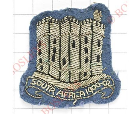 Northumberland Hussars NCO’s bullion arm badge.Silver wire Alnwick Castle resting on “South Africa 1900-02” scroll embroidere