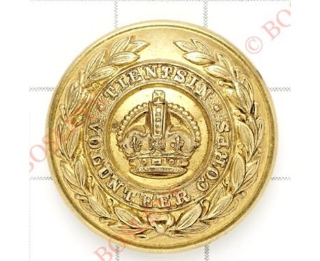 Chinese. Tienstsin Volunteer Corps Officer’s gilt button circa 1902-42.Title circlet resting in laurel sprays, crown to centr