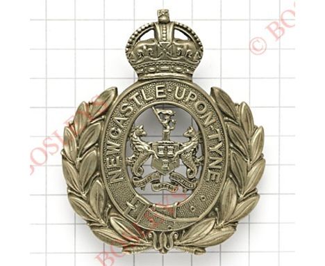 Newcastle upon Tyne Police helmet plate.Die-stamped chromed crowned oval strap “Newcastle upon Tyne” resting in laurel wreath
