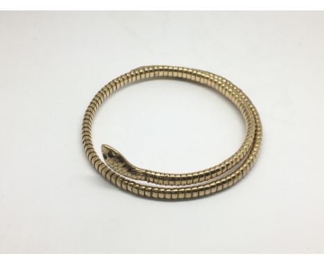 A 9ct gold snake bangle, approx 20g.