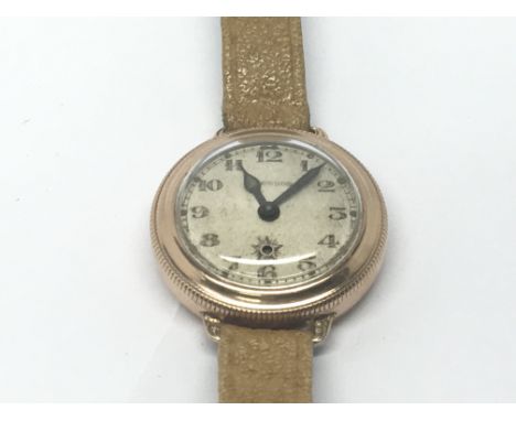 A rare John Harwood gold cased Worlds first Automatic watch this model of watch was first exhibited in 1926 and put into prod