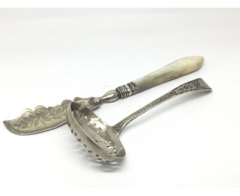 A George III silver sugar caster and a Victorian silver and mother of Pearl butter knife (2)