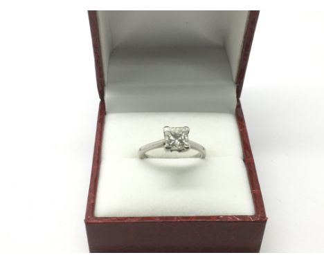 An 18ct white gold princess cut cut diamond ring , approx 1.48ct, approx colour K, approx clarity Si.1, approx size K-L and a