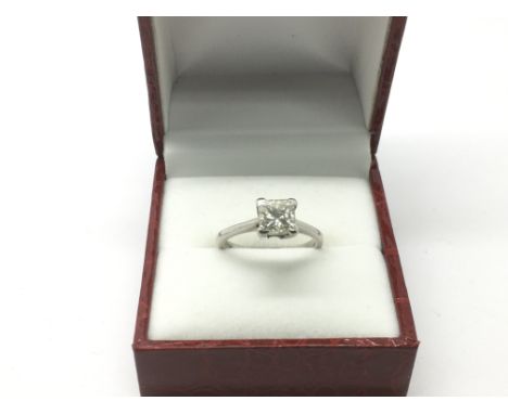 An 18ct white gold princess cut cut diamond ring , approx 1.48ct, approx colour K, approx clarity Si.1, approx size K-L and a