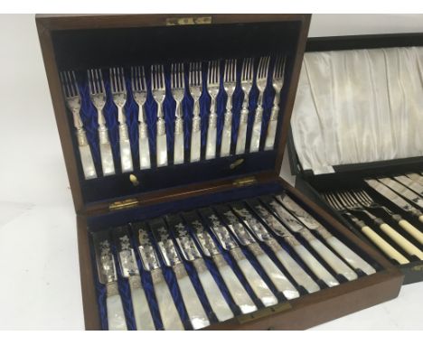 A Quality cased set of silver plated and mother of pearl handles fruit knifes and folks and one other cased set of fish knife