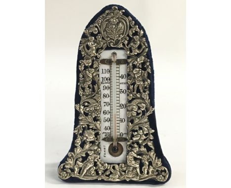 An antique William Comnys silver desk thermometer.