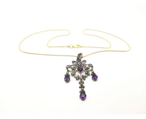 A yellow metal pendant set with amethyst, pearl and small diamonds.