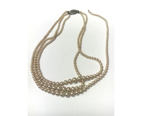 A Three string Pearl necklace, boxed. A/f as pictured  - NO RESERVE