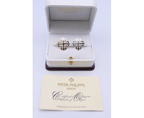 A pair of Patek Phillipe cufflinks, stamped 925 Geneva, in a Hackett of London box, with certificate.