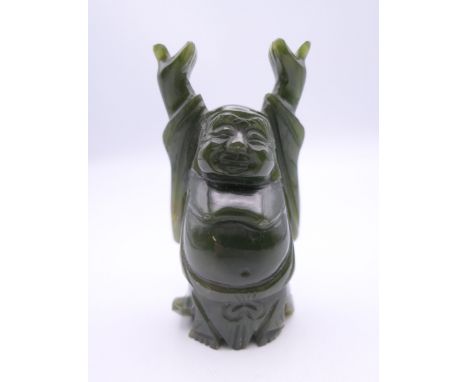 A jade Buddha.  7.5 cm high.