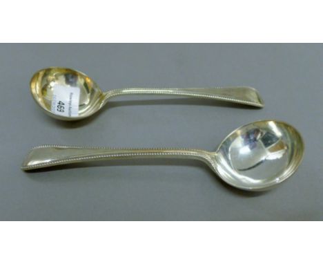 A pair of silver sauce ladles. 17.5 cm long. 156.2 grammes.