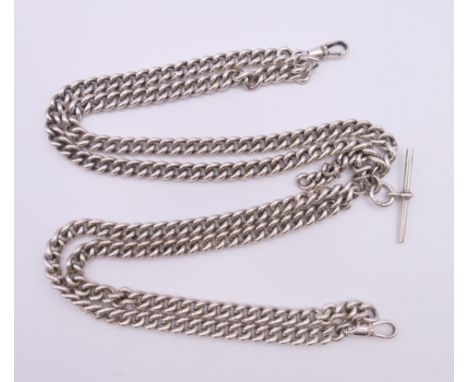 A silver curb link double Albert watch chain. 54.5 cm long. 145.5 grammes.