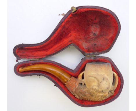 A Victorian cased Meerschaum pipe formed as a claw, 10 cm long.