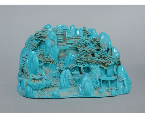 A Chinese model of a boulder carving. 21 cm wide.
