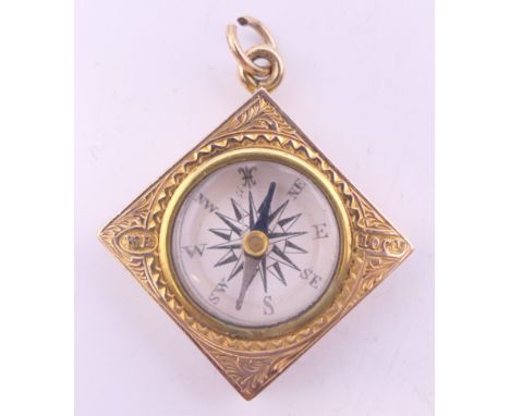A 10 ct gold square compass fob. 2.5 cm high. 4.6 grammes total weight.