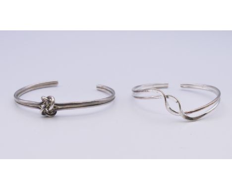 Two silver bangles. 28.8 grammes. 